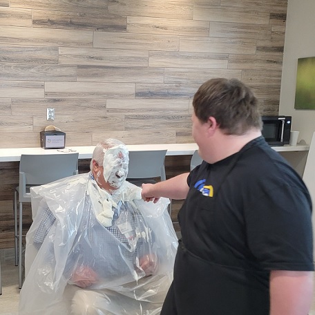 Project SEARCH Intern Ian Bergstrom Got to Put a Pie in the Face of North Central Kansas Medical Center Administrator Dave Garnas on Tuesday, March 21st