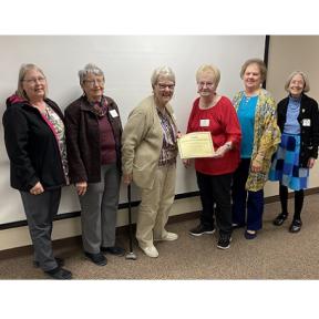 Jean Buoy, HVK Dist. 3 Coordinator, Presents Gold Award to NCKMC Volunteers From left – Marie Cairns, Shirley Moynihan, Marilyn Flesher, Jean Buoy, Pam Campbell, and Mary Jane Hurley.